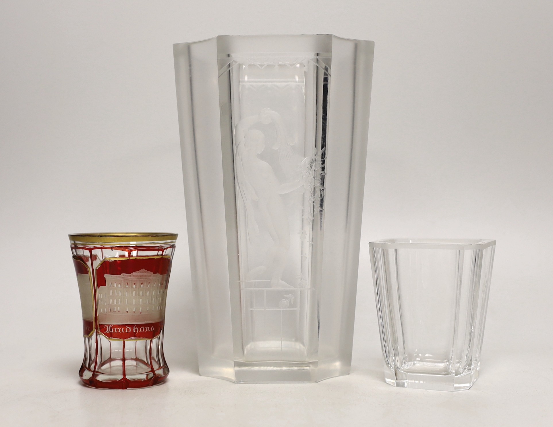 A 19th century Bohemian overlaid tumbler and two engraved vases. Tallest 21cm